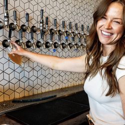 Distant Brewing - One of our servers pouring a beer.