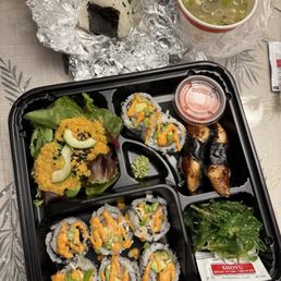Bento box with spicy salmon roll and eel Bento box with spicy salmon roll and eel