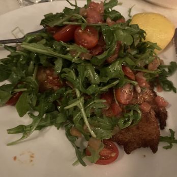 Via Della Pace - Chicken Milanese covered with lemon seasoned Arugula salad - Italian Near Me - New York, New York Via Della Pace - Chicken Milanese covered with lemon seasoned Arugula salad - Italian Near Me - New York, New York