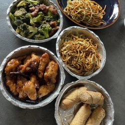 8. Orange Chicken, 1. Egg Roll, 22. Vegetable Lo Mein, beef and 11. Broccoli Beef