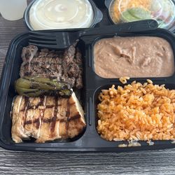 Fajita Pete's - Cypress - Chicken, fajita, beans & rice with flour tortillas and chips and salsa with queso and guac and cheese and lettuce very very very delicious