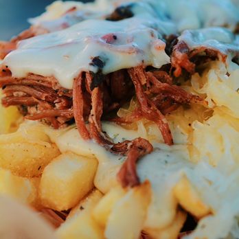 The Zingaro - Reuben Poutine- Fries covered in German Gravy, topped with Sauerkraut, House Made Pastrami, and Swiss Cheese - Food Trucks Near Me - Veneta, Oregon The Zingaro - Reuben Poutine- Fries covered in German Gravy, topped with Sauerkraut, House Made Pastrami, and Swiss Cheese - Food Trucks Near Me - Veneta, Oregon