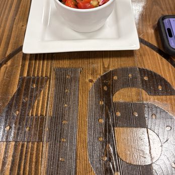 46 Restaurant & Grill - Tomato Cucumber Salad with signature table branding at all the tables - Salad Near Me - Barling, Arkansas 46 Restaurant & Grill - Tomato Cucumber Salad with signature table branding at all the tables - Salad Near Me - Barling, Arkansas