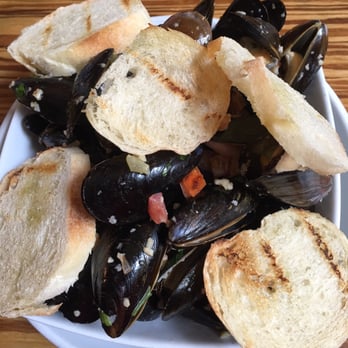 The Continental Westhampton - French Style Mussels - white wine, butter, shallots, tomato, celery, garlic, parsley broth, cream, served with crostini - New American Near Me - Richmond, Virginia The Continental Westhampton - French Style Mussels - white wine, butter, shallots, tomato, celery, garlic, parsley broth, cream, served with crostini - New American Near Me - Richmond, Virginia