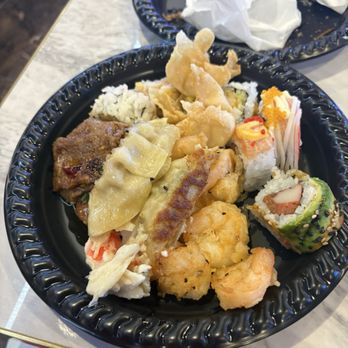 Umi Hotpot Sushi Buffet - Pot stickers assortment of sushi garlic shrimp crab rations seafood bake pork belly - Sushi Bars Near Me - Tempe, Arizona