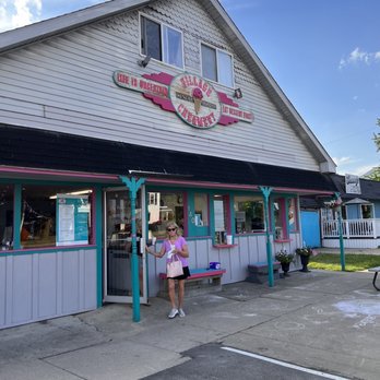 Village Creamery - a woman standing in front of the store - Ice Cream & Frozen Yogurt Near Me - Brooklyn, Michigan Village Creamery - a woman standing in front of the store - Ice Cream & Frozen Yogurt Near Me - Brooklyn, Michigan