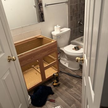Ground Up Contracting - Bathroom remodel mid-job photo new flooring, toilet, tile work in shower - Roofing Near Me Ground Up Contracting - Bathroom remodel mid-job photo new flooring, toilet, tile work in shower - Roofing Near Me