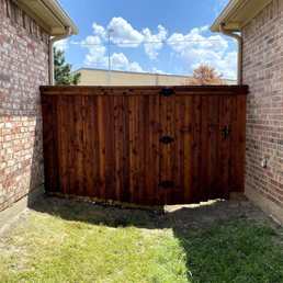 Joint street facing fence replaced with a gate