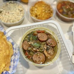 Tori's Place - Small gumbo with rice, sides in the background