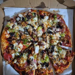 Douggy Fresh Pizza - Medium Combo Pizza: Pepperoni, Ham, Salami, Linguica, Ital Sausage, Grnd Beef, Shrooms, Bell Pepper, Onions and Olives.