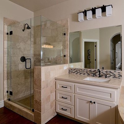 Bathroom remodel renovation - This bathroom remodel was done on an old outdated bathroom that was in bad shape. The rest of the house had been updated, so the bathroom stuck out like a sore thumb. We got it it and put in a new walk in Shower And vanity including fixtures To match the overall tone of the house and even added in a custom backsplash to give it some more character. The owner obviously loves there shower now. Bathroom remodel renovation - This bathroom remodel was done on an old outdated bathroom that was in bad shape. The rest of the house had been updated, so the bathroom stuck out like a sore thumb. We got it it and put in a new walk in Shower And vanity including fixtures To match the overall tone of the house and even added in a custom backsplash to give it some more character. The owner obviously loves there shower now.