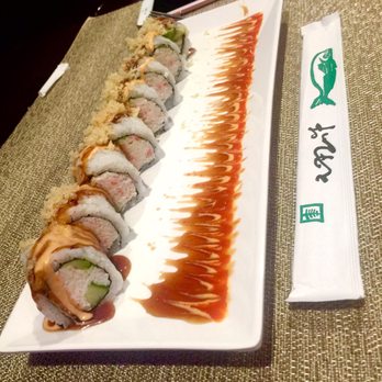 Sushi Plus - California Crunch Roll topped with spicy mayo and eel sauce. So delicious and LOOK at that fire design. This guy is so talented! - Sushi Bars Near Me - Glendale, Arizona Sushi Plus - California Crunch Roll topped with spicy mayo and eel sauce. So delicious and LOOK at that fire design. This guy is so talented! - Sushi Bars Near Me - Glendale, Arizona