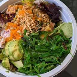 Large poke bowl with avocado (extra charge) and a sampling of toppings