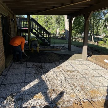 Eden Design Group - a man working on a patio - Landscaping Near Me Eden Design Group - a man working on a patio - Landscaping Near Me