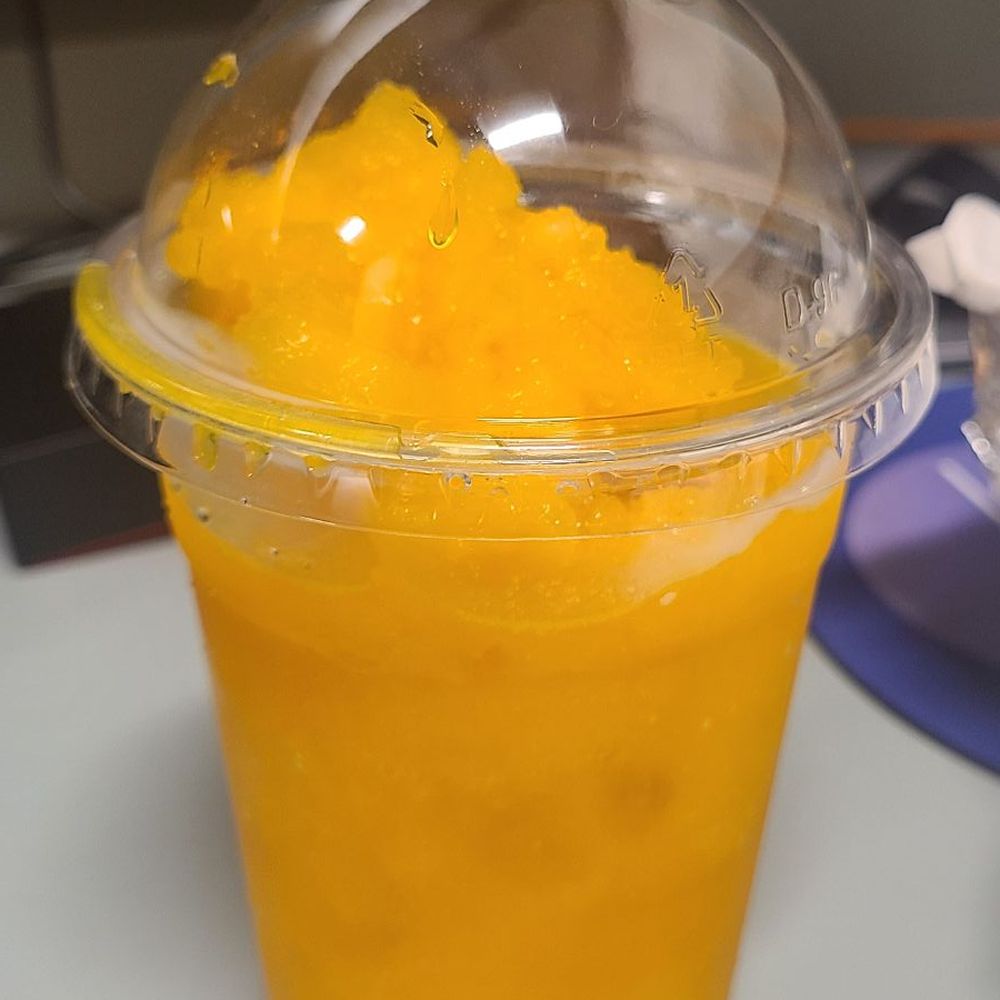 Peach & Mango "Smoothie" slushy with chunks of ice, as you can see in the pic