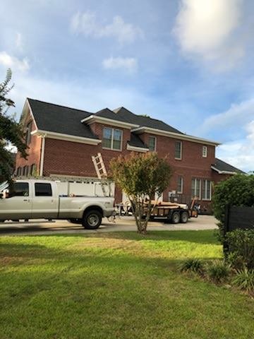 Slide of Total Roofing Solutions and Construction