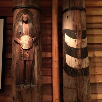 Hibulb Cultural Center - Two of the original long house poles from Tulalip tribe circa 1914 - Museums Near Me - Tulalip, Washington