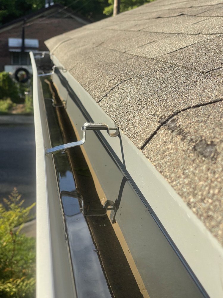 Slide of Marcus Gutters Cleaning