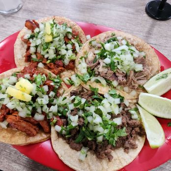 Las Brazas Taquería - Tacos starting from the top left, counterclockwise: al pastor, carnitas, asada, al pastor - Tacos Near Me - Lafayette, Indiana
