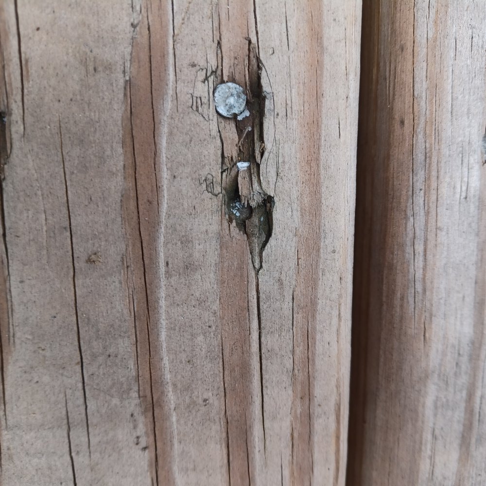 Ocean State Home Improvement - Dozens of exposed nails not nailed properly. Some nails almost go through the boards due to the nailhun not being set properly. - Windows Installation Near Me - Johnston, Rhode Island