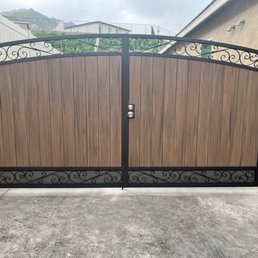 Double Iron gate with English Walnut Composite Wood, with paint oil rubbed bronze.