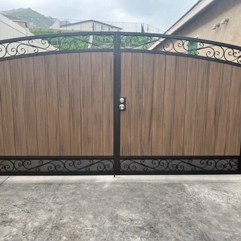 Duran Custom Iron Gates - Double Iron gate with English Walnut Composite Wood, with paint oil rubbed bronze. - Fences & Gates Near Me