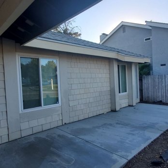 QTC Landscape Construction - Added cement patio in front - Artificial Turf Near Me