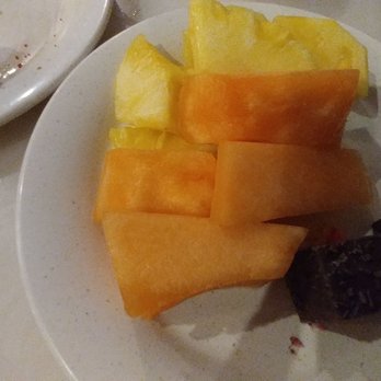 Flaming Grill & Supreme Buffet - Fruir plate with pineapple, cantaloupe and rainbow cookie cake - Buffets Near Me - Baldwin, New York
