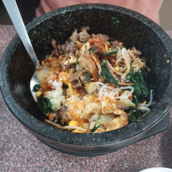 Atypical Restaurant - Bibimbap the hot version in the sizzling Stone bowl. - Korean Near Me - Columbia, South Carolina Atypical Restaurant - Bibimbap the hot version in the sizzling Stone bowl. - Korean Near Me - Columbia, South Carolina