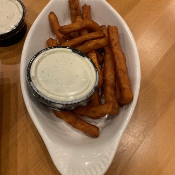 Just Wingin It - The side of sweet potato fries that comes with bone in wings......... - Chicken Wings Near Me - Baton Rouge, Louisiana