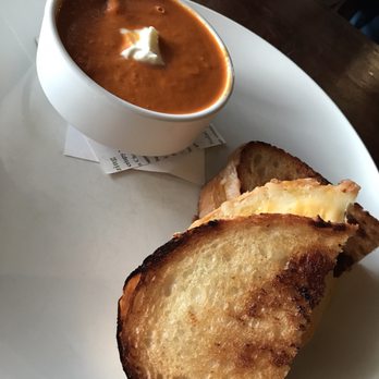Graze - Grilled cheese on sour dough with garlic tomato bisque for lunch - New American Near Me - Mount Pleasant, South Carolina Graze - Grilled cheese on sour dough with garlic tomato bisque for lunch - New American Near Me - Mount Pleasant, South Carolina