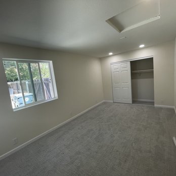 Jaguar Construction - empty room with closet and sliding glass door - General Contractors Near Me - Sacramento, California