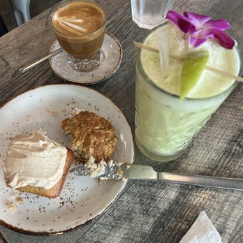 The Aussie Grind - The Sydney juice cookie, some delicious bread and my macchiato - Cafes Near Me - Frisco, Texas The Aussie Grind - The Sydney juice cookie, some delicious bread and my macchiato - Cafes Near Me - Frisco, Texas