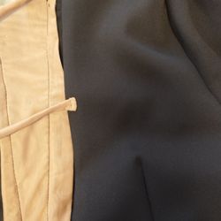 Manuel Shoe Repair and Alteration  - Stitching on outside of dress