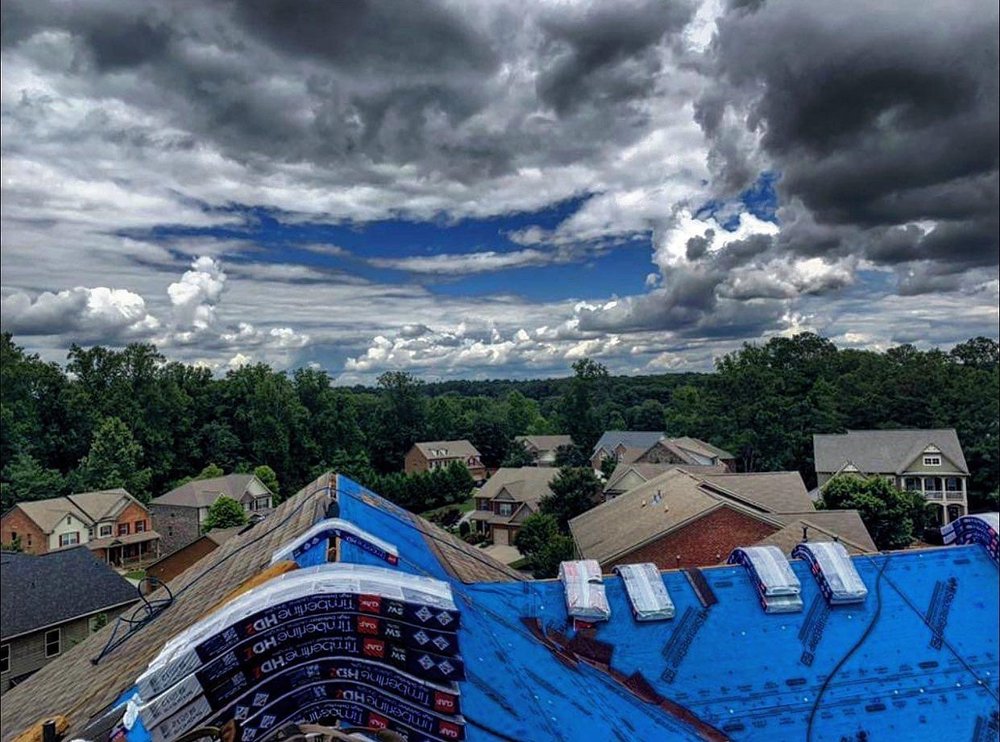 Slide of Escex Roofing and Restorations