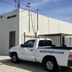 Good Auto Glass - Work in done in their garage, in the back of the storefront.  You'll see their work truck in the back