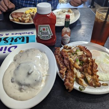 The Diner at Twisters - a plate of fried eggs, bacon, and gravy - Ice Cream & Frozen Yogurt Near Me - Knoxville, Tennessee The Diner at Twisters - a plate of fried eggs, bacon, and gravy - Ice Cream & Frozen Yogurt Near Me - Knoxville, Tennessee