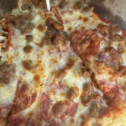 Buccilli's Pizza - Clare - Pepperoni, ground beef, sausage on half and onion on other half!