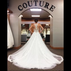 Elaine's Wedding and Event Center - Gorgeous gown modeled by one of our stylists in our store.
