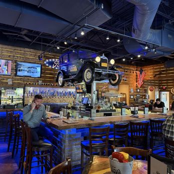Ford's Garage Dearborn - Main dining room and bar - Burgers Near Me - Dearborn, Michigan Ford's Garage Dearborn - Main dining room and bar - Burgers Near Me - Dearborn, Michigan