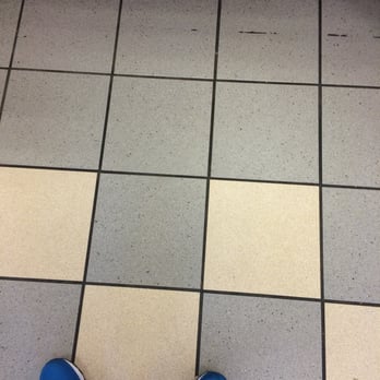 Dunkin' -  a person standing on a tiled floor - Donuts Near Me - Union, New Jersey
