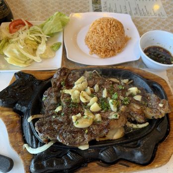 Khởi Hưng Restaurant - 14. ribeye w/ garlic butter, salad, red rice, dipping sauce - Vietnamese Near Me - Garden Grove, California Khởi Hưng Restaurant - 14. ribeye w/ garlic butter, salad, red rice, dipping sauce - Vietnamese Near Me - Garden Grove, California
