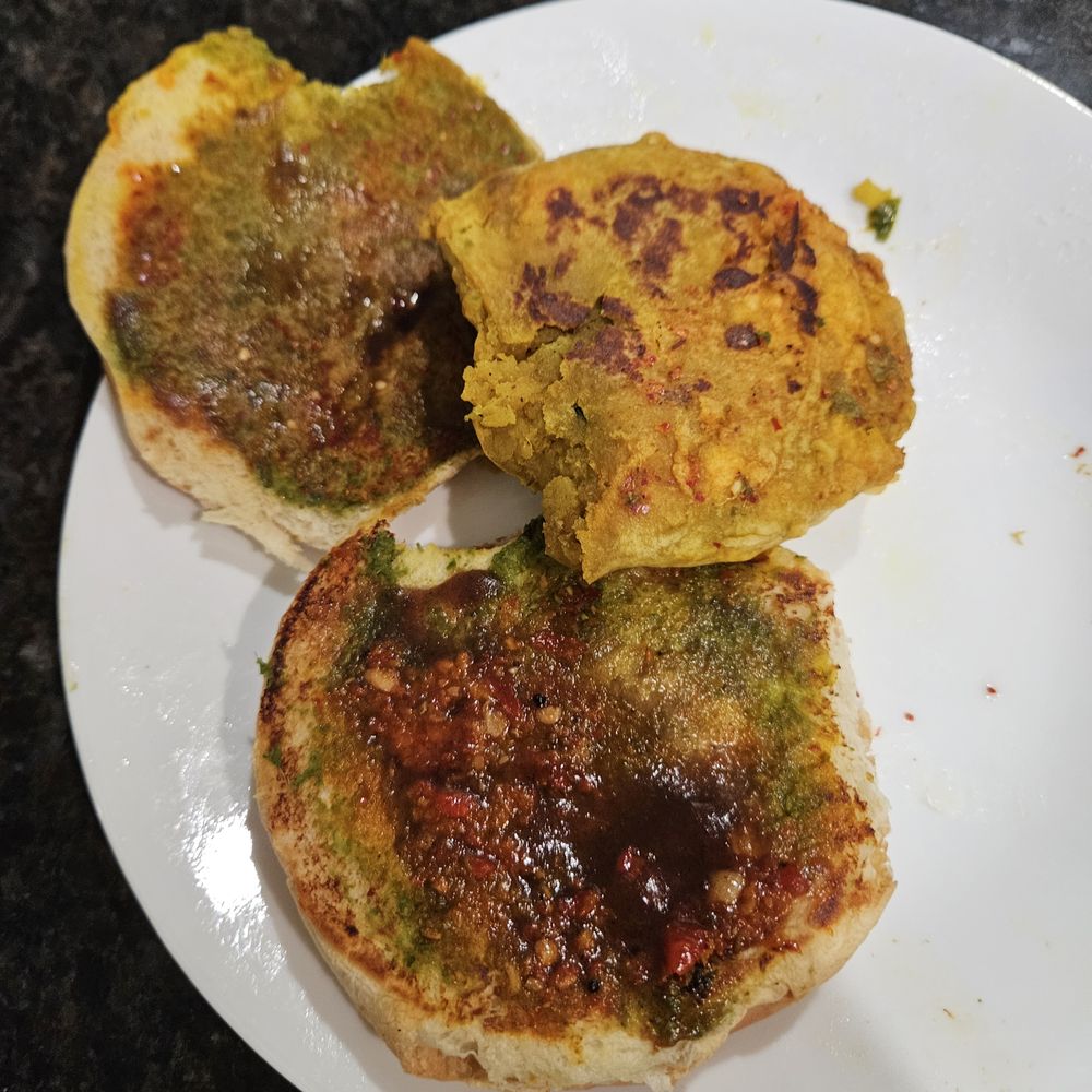Bombay Street Food - My improved version of vada pav after toasting the pav, adding chutney and toasting the vada a little - Indian Near Me - Austin, Texas