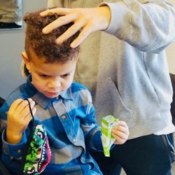 Martin's Barber Shop - Zeke getting his 1st big boy haircut