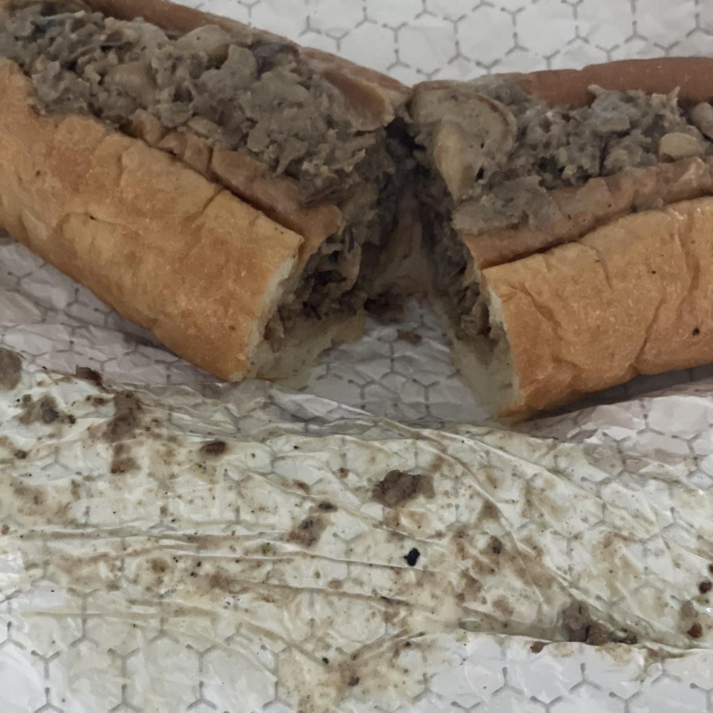 Loading Zone Philly Steaks - Philly cheesesteaks with onions and mushrooms - Cheesesteaks Near Me - Orlando, Florida Loading Zone Philly Steaks - Philly cheesesteaks with onions and mushrooms - Cheesesteaks Near Me - Orlando, Florida