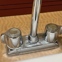 Faucet that needs cleaning Faucet that needs cleaning