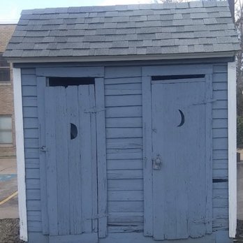 St. Francis County Museum - double outhouse exhibit (not in active use) - Museums Near Me - Forrest City, Arkansas