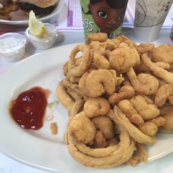 Logan's Run - When in New England... fried shrimp with onion rings. - Sports Bars Near Me - Hampton, New Hampshire