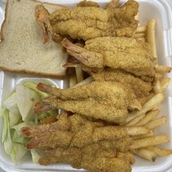 "Fried shrimp" with fries. Someone else has this labeled tempura  shrimp. I should have taken a bite & photographed the inside.