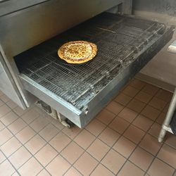 Sareini's Pizzeria - Let me pull it out the oven myself!